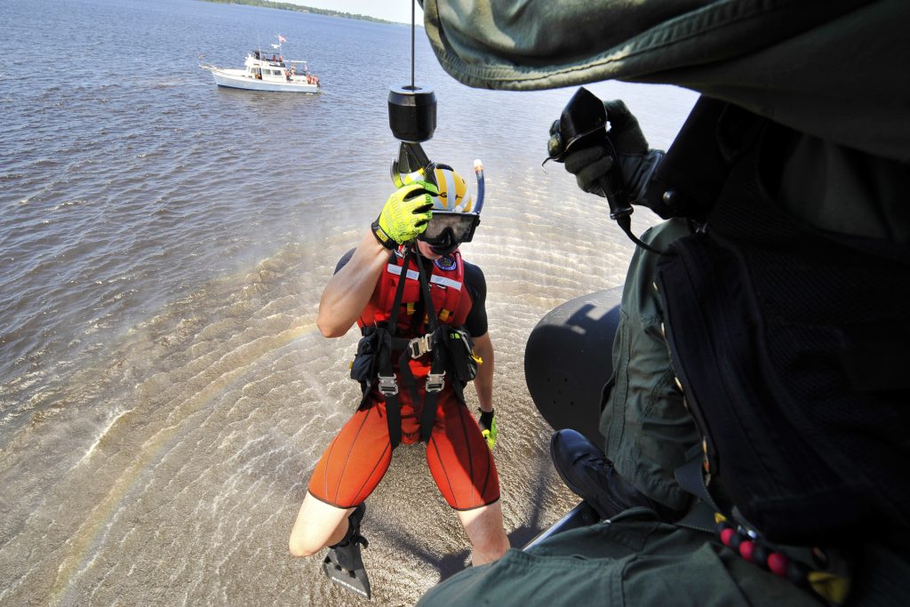 Rescue Swimmer doing hoist training